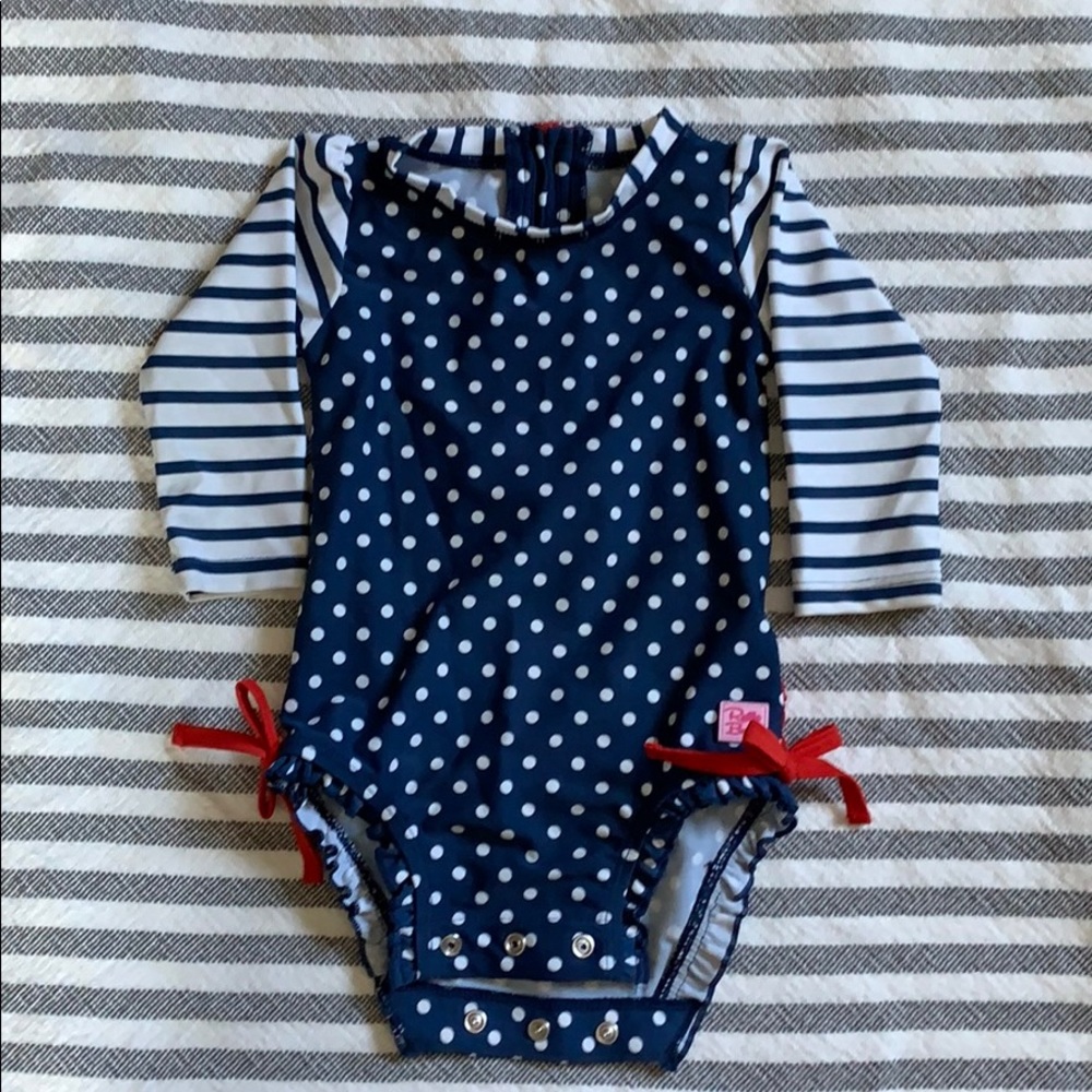 Ruffle Butts Navy Polka Dot One Piece Rash Guard